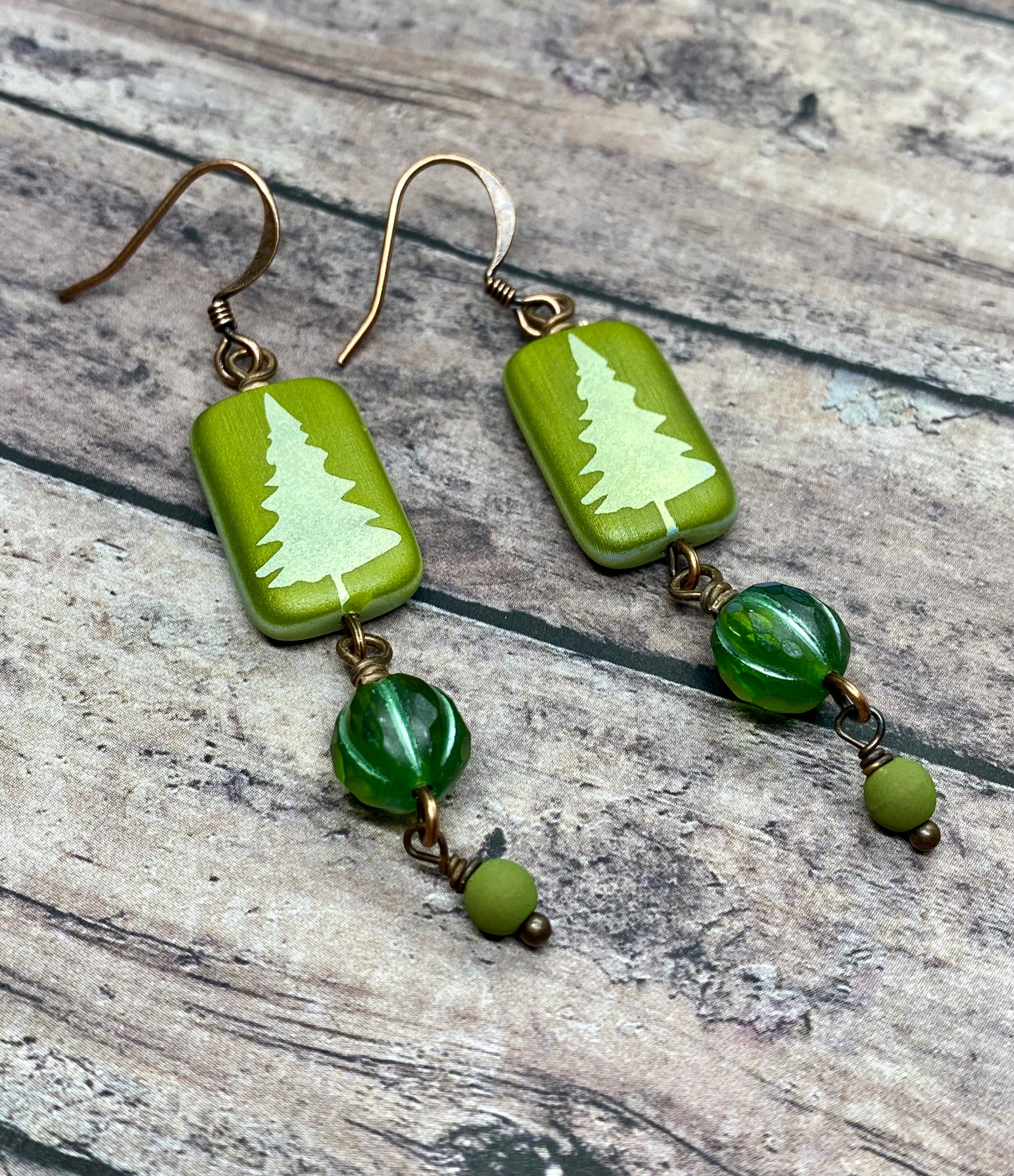 Handcrafted green tree earrings.  Item #s1123-e18